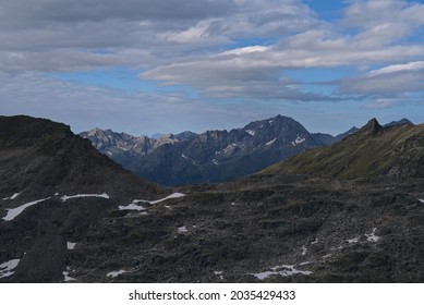 Hiking in Mölltaler Glacier area, high mountains, glacier, waterdams and cows on pastures