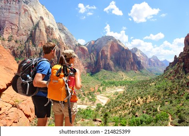 Hiking - Hikers Looking At View In Zion National Park. People Living Healthy Active Lifestyle Dong Hike In Beautiful Nature Landscape To Observation Point Near Angles Landing, Zion Canyon, Utah, USA.