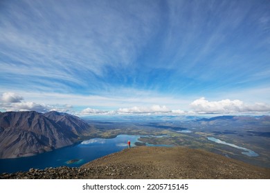 Hiking Man In Canadian Mountains. Hike Is The Popular Recreation Activity In North America. There Are A Lot Of Picturesque Trails.