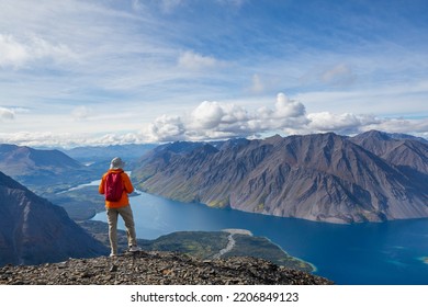 Hiking Man In Canadian Mountains. Hike Is The Popular Recreation Activity In North America. There Are A Lot Of Picturesque Trails.