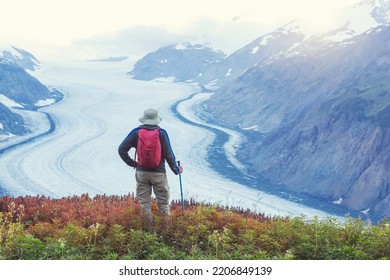 Hiking Man In Canadian Mountains. Hike Is The Popular Recreation Activity In North America. There Are A Lot Of Picturesque Trails.