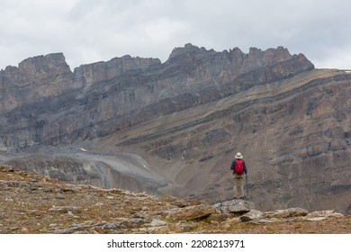 Hiking Man In Canadian Mountains. Hike Is The Popular Recreation Activity In North America. There Are A Lot Of Picturesque Trails.