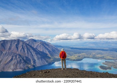 Hiking Man In Canadian Mountains. Hike Is The Popular Recreation Activity In North America. There Are A Lot Of Picturesque Trails.