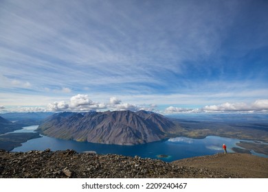 Hiking Man In Canadian Mountains. Hike Is The Popular Recreation Activity In North America. There Are A Lot Of Picturesque Trails.