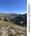 Hiking on the Death Canyon Shelf with a view of Death Canyon in Grand Teton, WY.