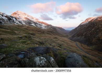 Hiking On Pyg Track Climbing Mount Snowdon, Snowcaped Snowdonia, North Wales In The Sun And Snow