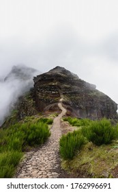 Hiking path between Pico do Arieiro and Pico do Ruivo above the clouds