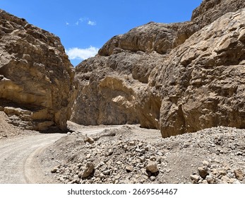 A hiking path between rocky cliffs trails in Titus Canyon Road in Los Angeles