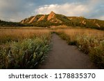 A hiking path leads to the Flatiron Mountains and adventure in Boulder Colorado