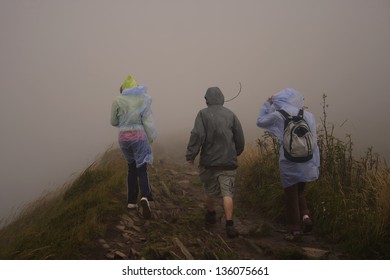 Hiking In The Rain. Mountain Landscape