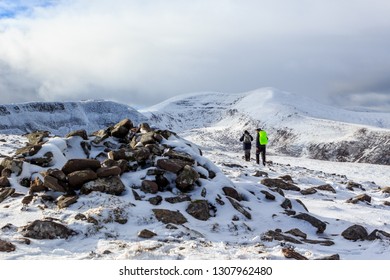 Hiking in the snow on the Slieve Mish mountains on the Dingle Peninsula in County Kerry, Ireland