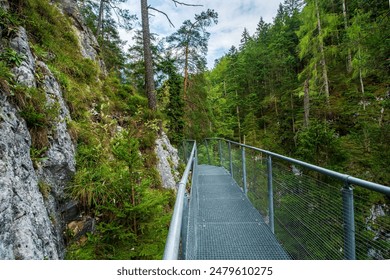 Hiking Trail Along a Cliffside Pathway - Powered by Shutterstock