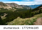 Hiking trail high in the Wheeler Wilderness nature area outdoor trails and empty vast Forests , valley , and Mountain Peaks in Northern New Mexico in Taos