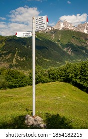 Hiking Trail Marker Outside Of Mestia, Svaneti, Georgia. Mt Ushba, Known As The 