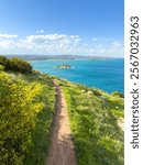 Hiking trail on The Bluff looking out over the ocean towards Granite Island in Victor Harbor on the Fleurieu Peninsula in South Australia