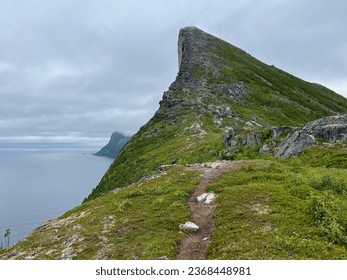 A hiking trail to the peak of the Segla mountain on Senja island in northern Norway