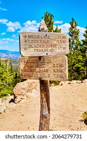 Hiking Trailhead Sign To Lakes With Desert Mountain Background