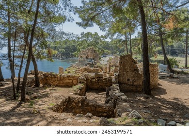 Hiking in Turkey: Lycian Way, coastal hike on the Turkish Riviera with beautiful views - the ancient site, city of Phaselis - Powered by Shutterstock