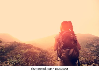 Hiking Woman Enjoy The Beautiful View At Mountain Peak 