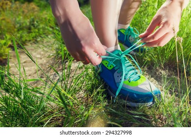 Hiking. Woman hikers walking on a grassy trail in the mountains. - Powered by Shutterstock