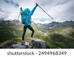 Hiking woman on high altitude mountain top