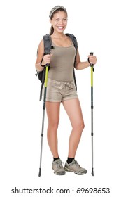 Hiking Woman Standing Isolated. Female Hiker With Backpacking Bag And Hiking Poles / Walking Sticks Isolated On White Background In Full Length.