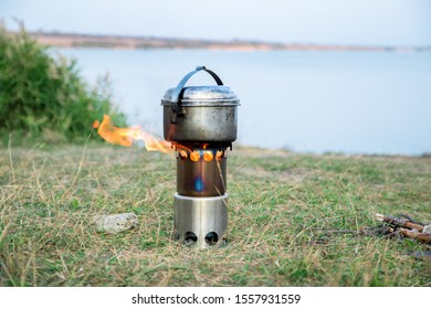 Hiking Woodstove And Kettle, Lake On The Background