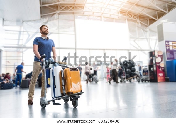 man carrying luggage