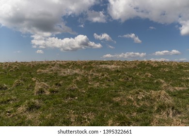 hill with dramatic clouds scene
