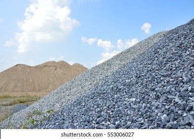 Hill Of Fine And Coarse Aggregate To The Blue Sky. Sand And Rock For Construction