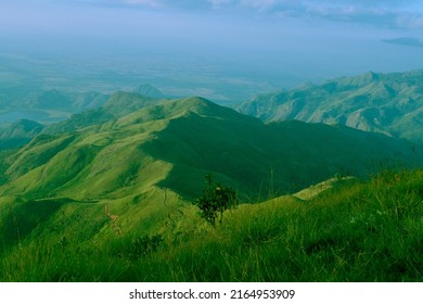 Hill top with leading hills and blue sky Image taken at Kodaikanal tamilnadu India from top of the hill. Image is showing the beautiful nature.