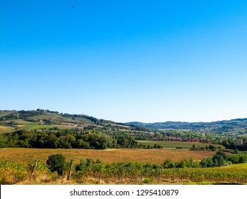 Hills, fields and meadows - typical views  Travel, nature and agriculture concept. Vacations in Italy. Copy space. - Shutterstock ID 1295410879