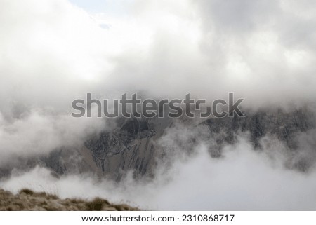 Hills and mountains in italy with clouds and blu sky
