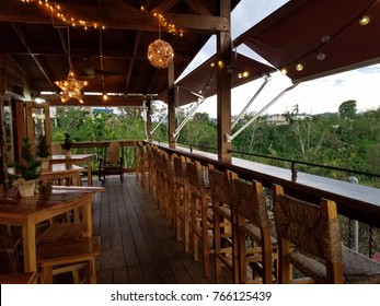 Café In Hills In Puerto Rico Overlooking Trees, Some Still Showing Damage From Hurricane Maria