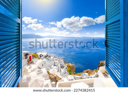 Hillside view through an open window with blue shutters of the caldera, sea and white village of Oia on the island of Santorini, Greece. Foto d'archivio © 