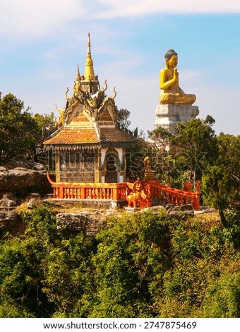 Hilltop Buddhist Temple Complex Overlooking Rural Landscape In Cambodia: Golden Roof Pagodas Surrounded By Forest And Countryside