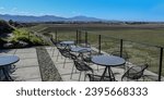 Hilltop restaurant with a scenic vineyard landscape in Blenheim, New Zealand.