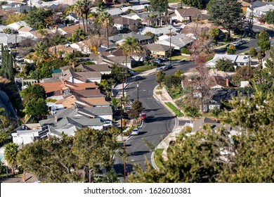 Hilltop view of houses and curvy suburban streets in the northeast San Fernando Valley area of  Los Angeles, California. 