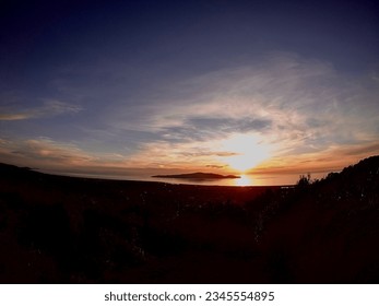 Hilltop views of sunset over the Kapiti Island captured from Hemi Matenga walking trail viewpoint 