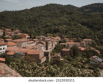 Hilltop village nestled in lush greenery - Powered by Shutterstock