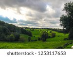 Hilly landscape with clouds 