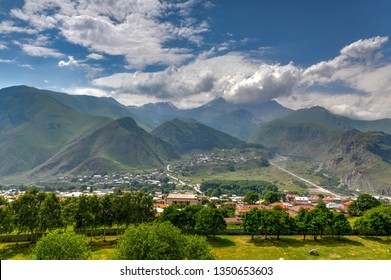 Hilly landscape near the village of Gergeti in Georgia, under Mount Kazbegi.