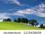 Hilly landscape with trrees near the Austria village Annaberg im Lammertal
