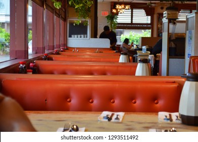 Hilo. Hawaii USA July 23 : Inside A Traditional American Diner With 1970s Decor Design Orange Seats And Booths. Taken In Ken's Diner In Hilo Hawaii On A Quiet Morning For Breakfast