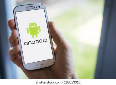 HILVERSUM, NETHERLANDS - MARCH 17, 2014: Android is an operating system based on the Linux kernel and designed for touchscreen mobile devices. The mobile HTC Dream, was successfully released in 2008.