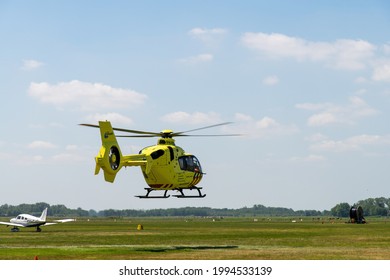 Hilversum, The Netherlands-June 2021; Close Up Of A Trauma Helicopter Just After Lift Off Above The Grass Hilversum Airfield