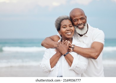 I am him, he is me. Shot of a mature couple spending time at the beach. - Powered by Shutterstock