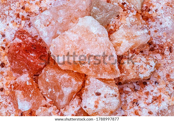Himalayan block salt, top\
view. Natural huge crystal Pakistani pink salt background,\
Himalayan coral pink Broken rock salt backdrop. TOP QUALITY\
Himalaya Salt Crystal\
