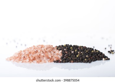 Himalayan rock salt and peppercorns. - Powered by Shutterstock