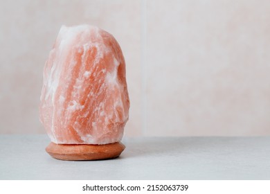 Himalayan Salt Lamp On Table, Stress Control, Calming Home Decor. Natural Salt Lamp To Reduce Stress And Purify Air